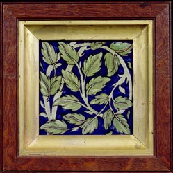 Tile with a leaf design